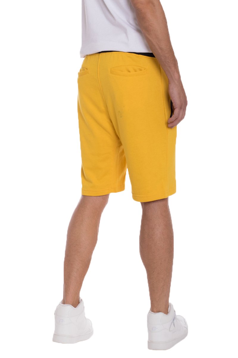 Yellow Lime Milo French Terry Shorts laid flat showing comfortable elastic waistband and soft fabric texture.