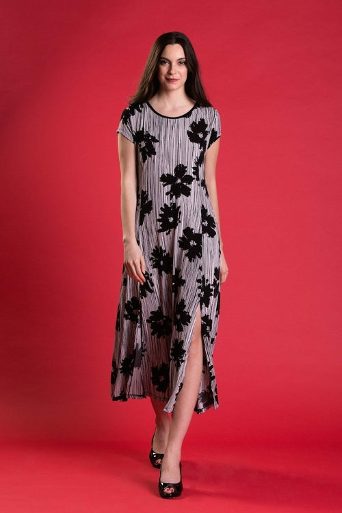 Purple Mango St. Tropez dress featuring a stylish striped and floral print in women&