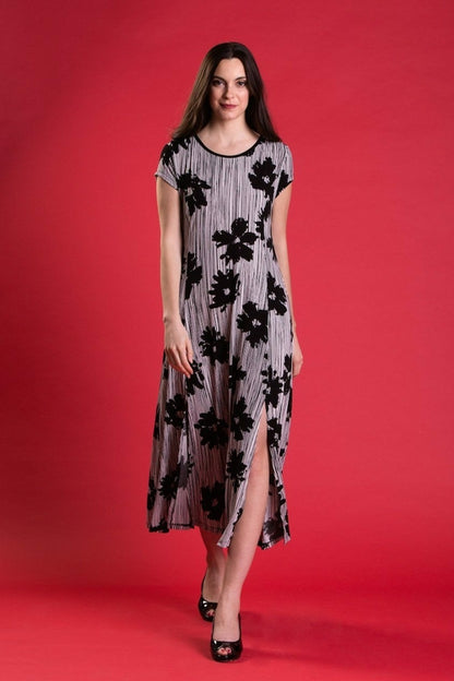 Purple Mango St. Tropez dress featuring a stylish striped and floral print in women&