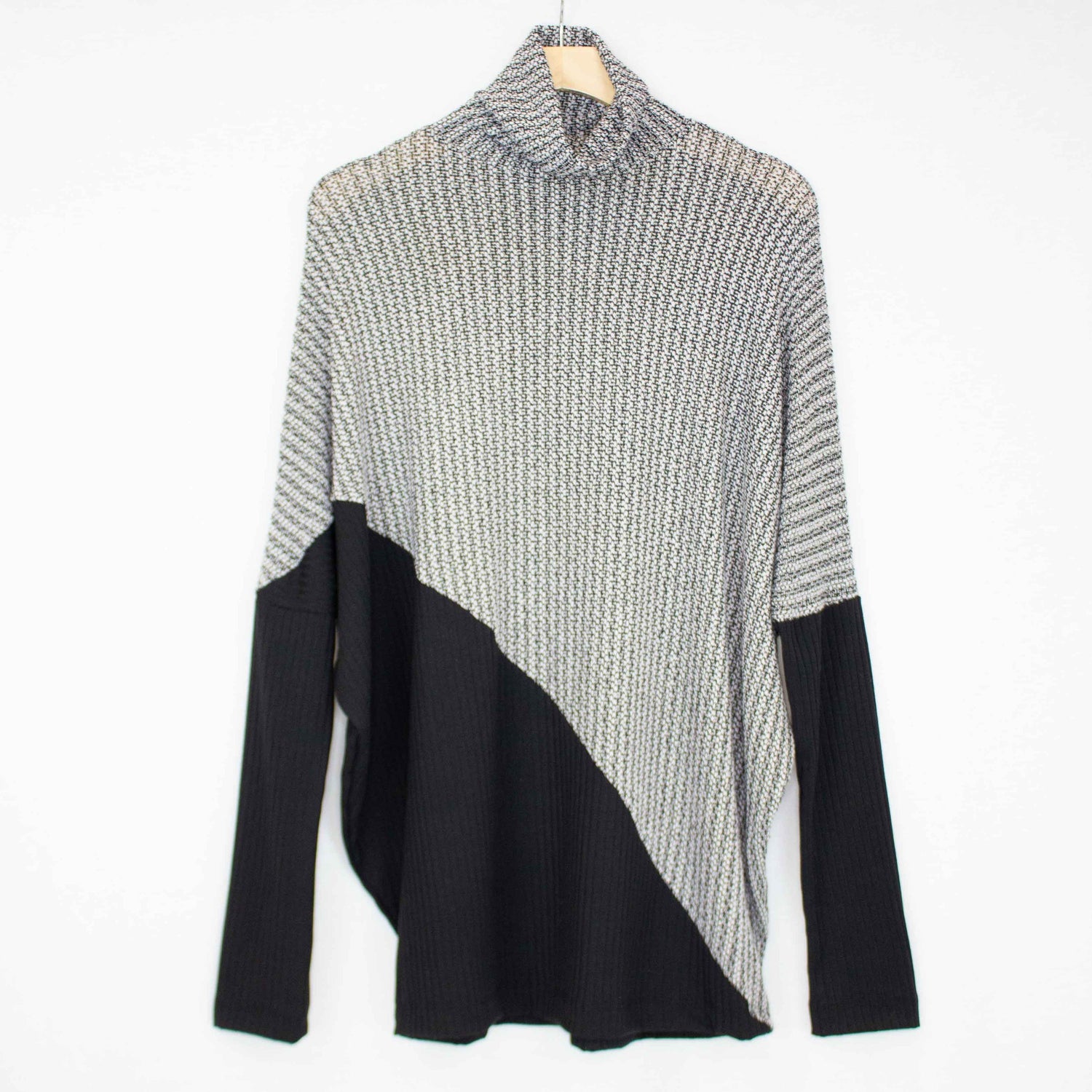 Yellow Hera turtle neck diagonal color block sweater, long-sleeve knit top with bold color blocking design.