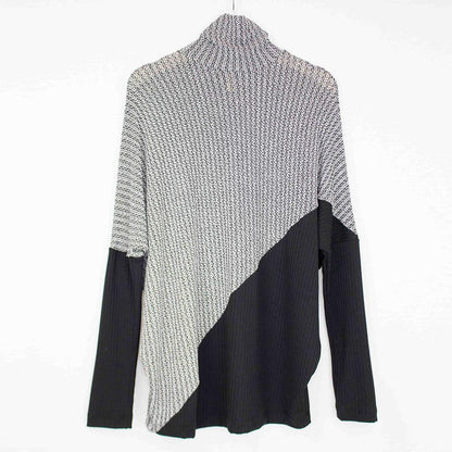 Yellow Hera turtle neck sweater with diagonal color block design, long sleeves, and cozy knit fabric.