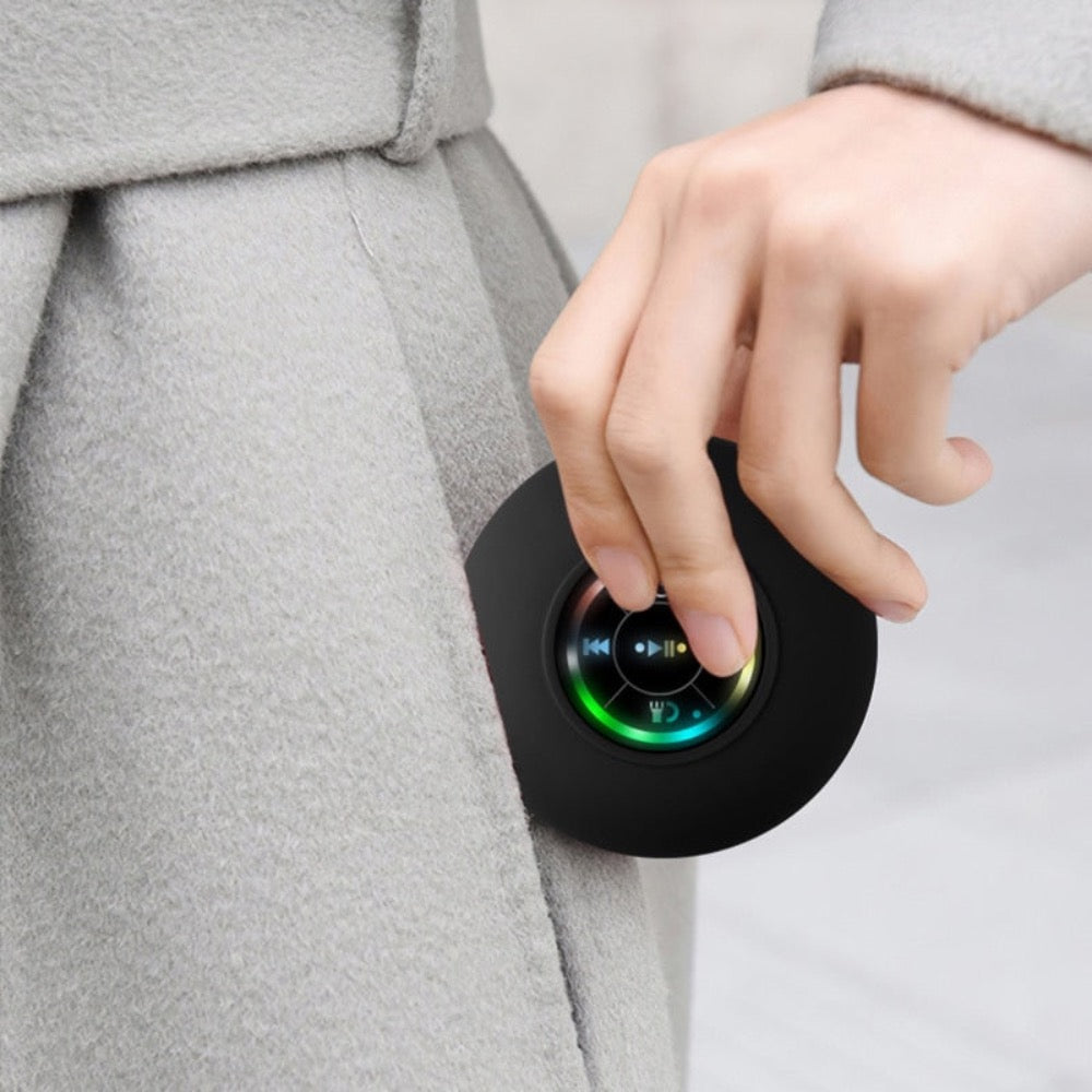 Mini Waterproof RGB Bluetooth speaker by Yellow Pandora showing vibrant LED lights and compact design for portable audio.