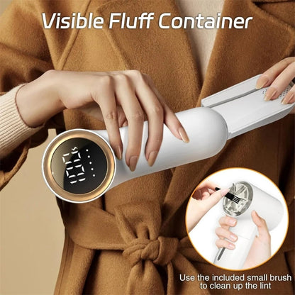 Maroon Asteria hairball trimmer removing fuzz and lint from a sweater, clothing shaver and lint remover for haircare and fabric care.