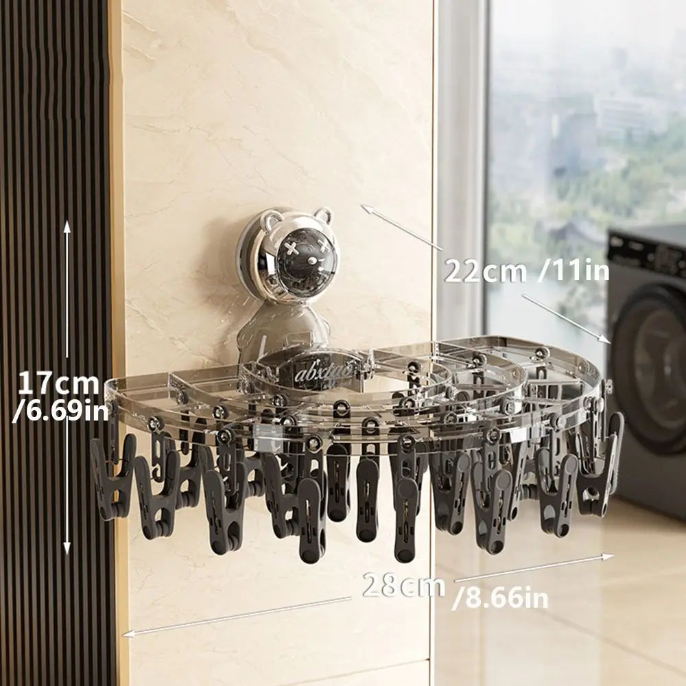 Maroon Asteria suction cup sock hanger with clips, foldable and retractable for drying and organizing socks on smooth surfaces.