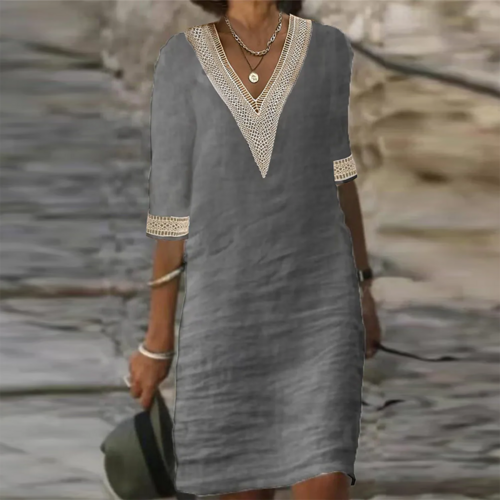Yellow Eleusis elegant cotton linen dress with stylish design, featuring a comfortable fit and natural fabric texture.