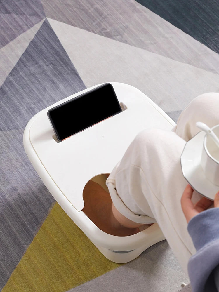 Foldable Pink Lucky footbath massage bucket for soaking, featuring a portable design and comfortable basin for relaxing spa foot soaks.