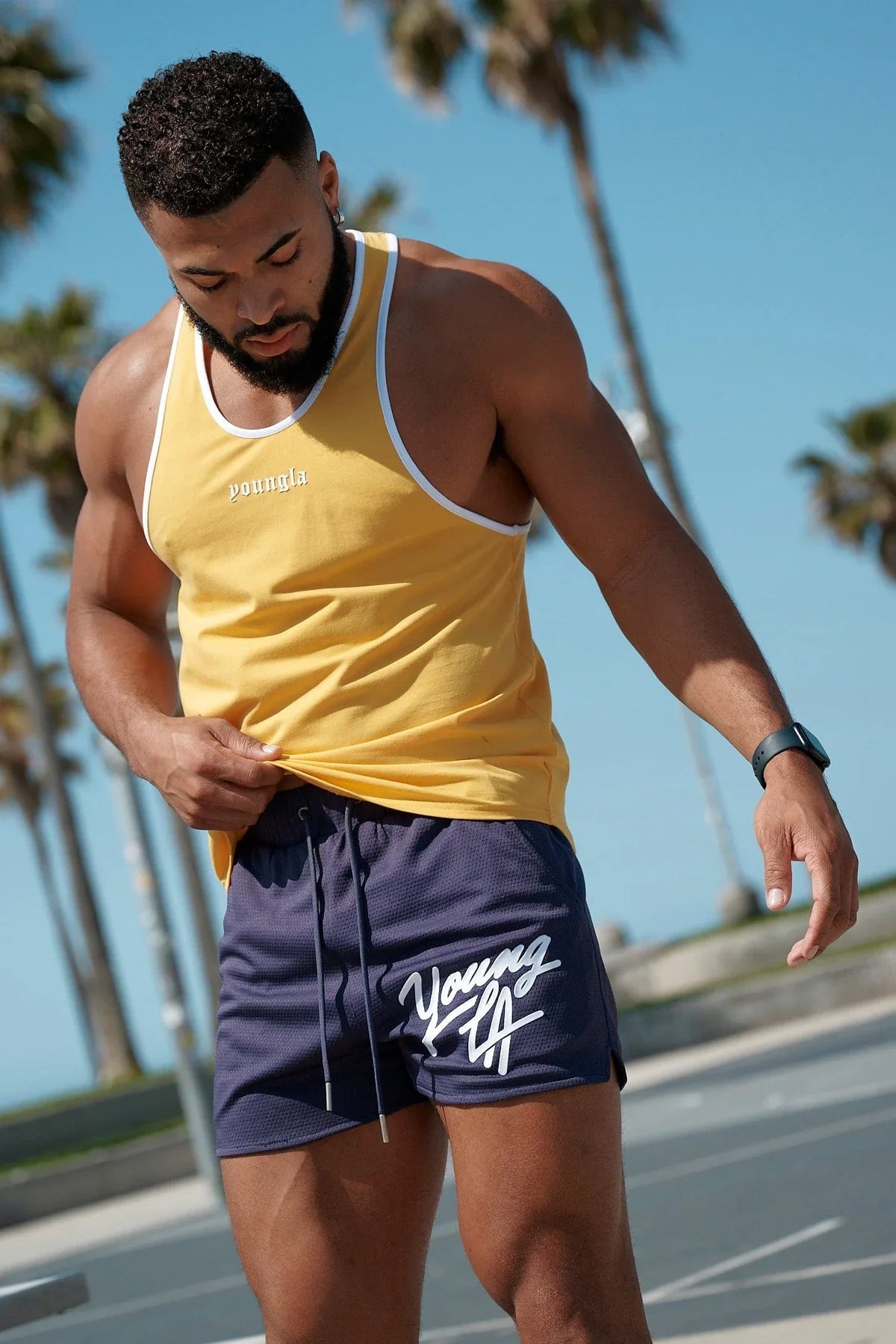Raspberry Eurybia Young LA trendy beach shorts with colorful patterns and lightweight fabric, suitable for casual summer wear.