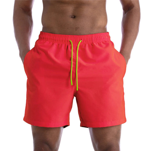 Raspberry Eurybia Sunga Beach Shorts swimwear with vibrant tropical print, lightweight fabric, and comfortable fit for beach or pool.