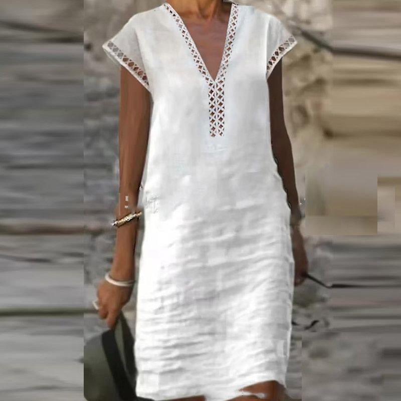 Elegant cotton linen dress by Yellow Eleusis, showcasing lightweight fabric and stylish design with a relaxed fit.