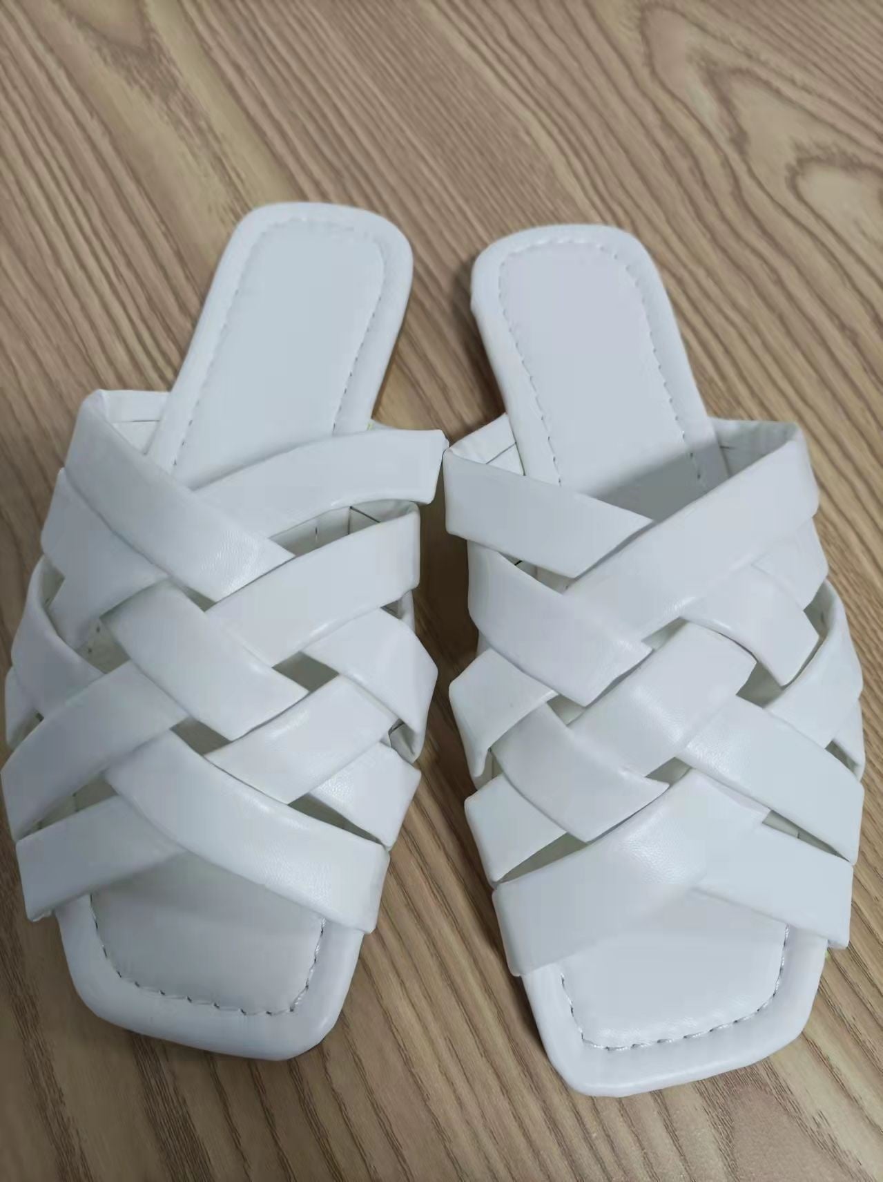 Red Iphigenia summer casual leather slippers for women in blue, pink, and beige with flat design and outdoor-friendly style.