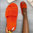 Red Iphigenia thick bottom embossed cotton fur women’s slippers with cozy, plush interior and textured embossed design.