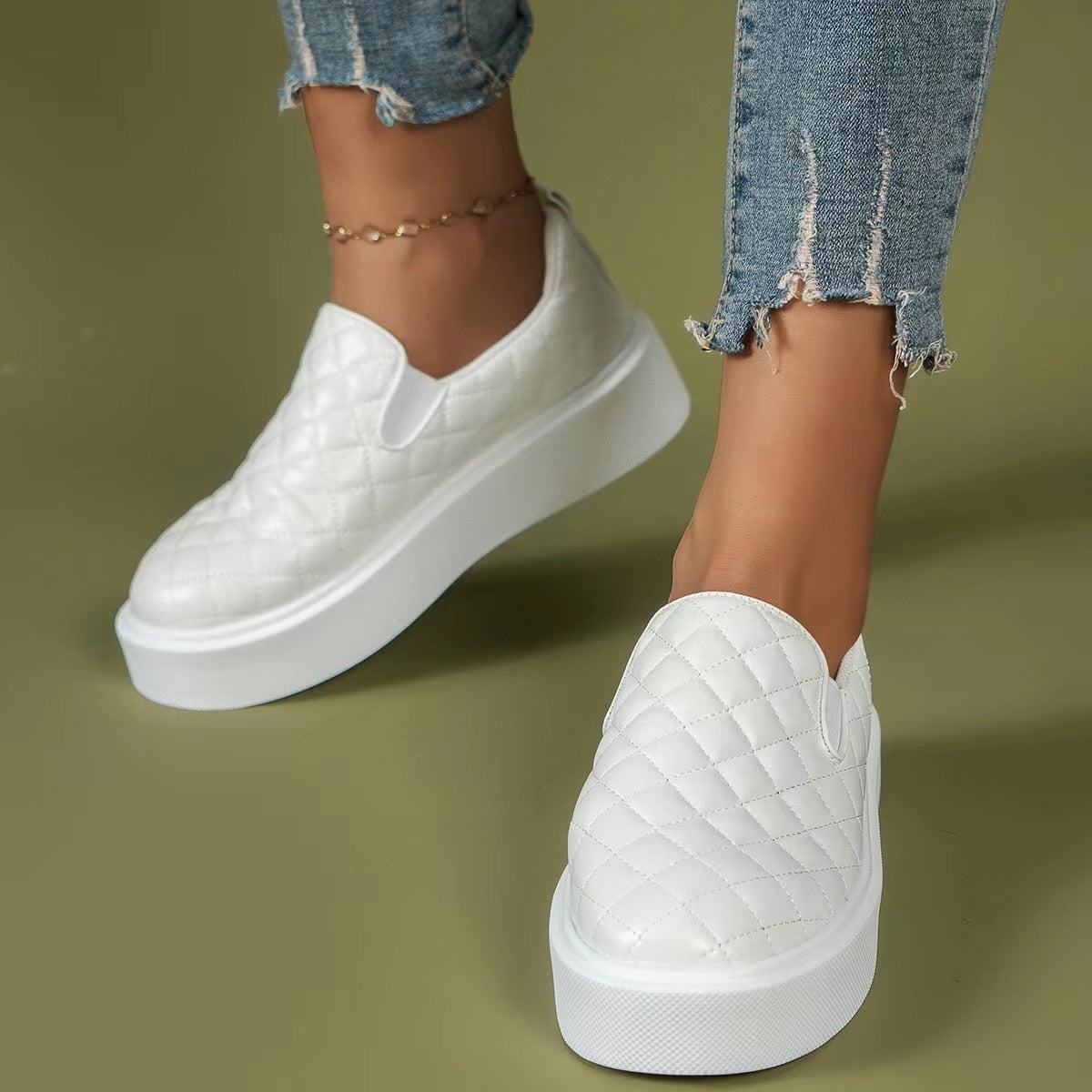 Black and white slip-on casual platform loafers by Coffee Jasper, lightweight flats with a sleek, comfortable design.