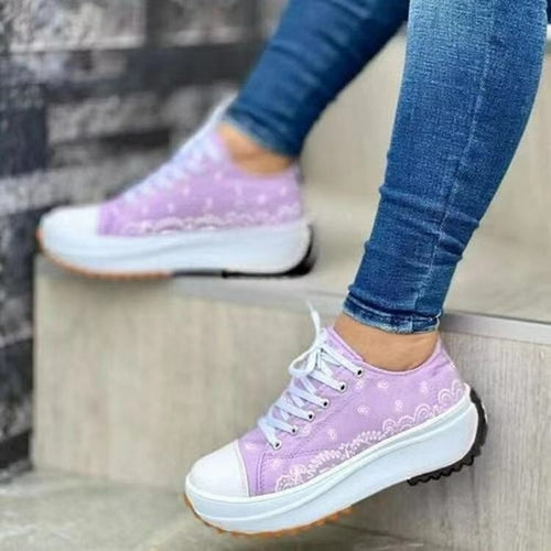 Red Iphigenia fashion pattern canvas women sneakers with casual sport style, featuring colorful activewear design and comfortable fit.