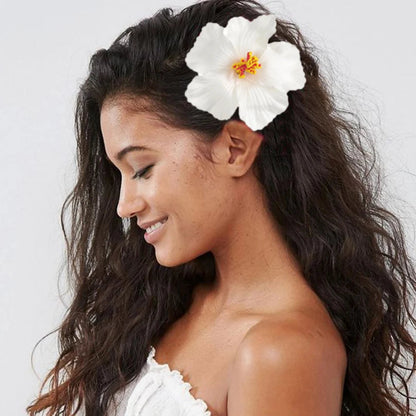 Raspberry Eurybia Hawaiian flower hair clip with colorful floral design, ideal for securing hair and adding tropical style.
