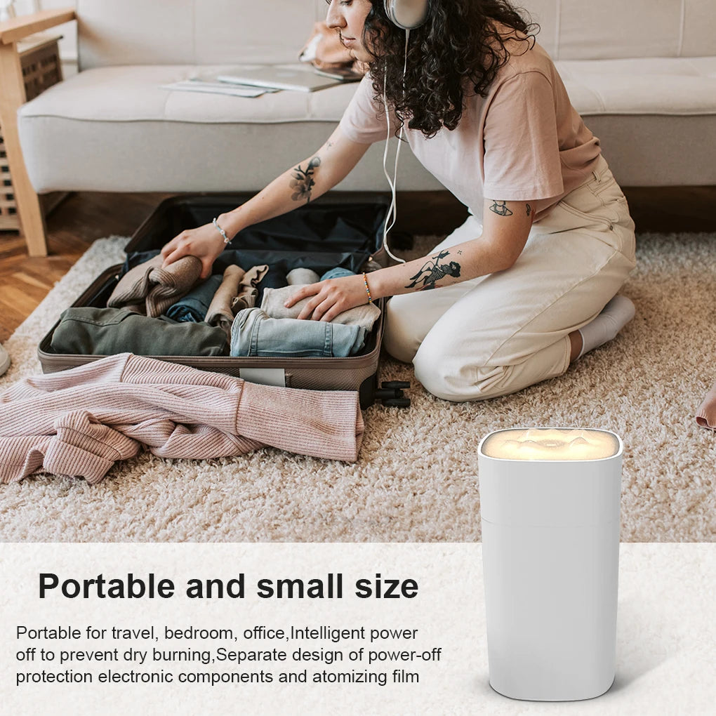 Maroon Asteria portable mini humidifier with mist spray, compact design, ideal for desktop use and aromatherapy.