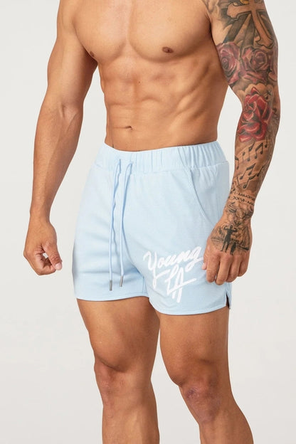 Raspberry Eurybia Young LA trendy beach shorts with colorful patterns, lightweight fabric, and comfortable fit for summer wear.
