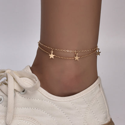 Silver plated Butterfly Bohemia ankle bracelet by Red Iphigenia with delicate chain and butterfly charm for boho-inspired style.
