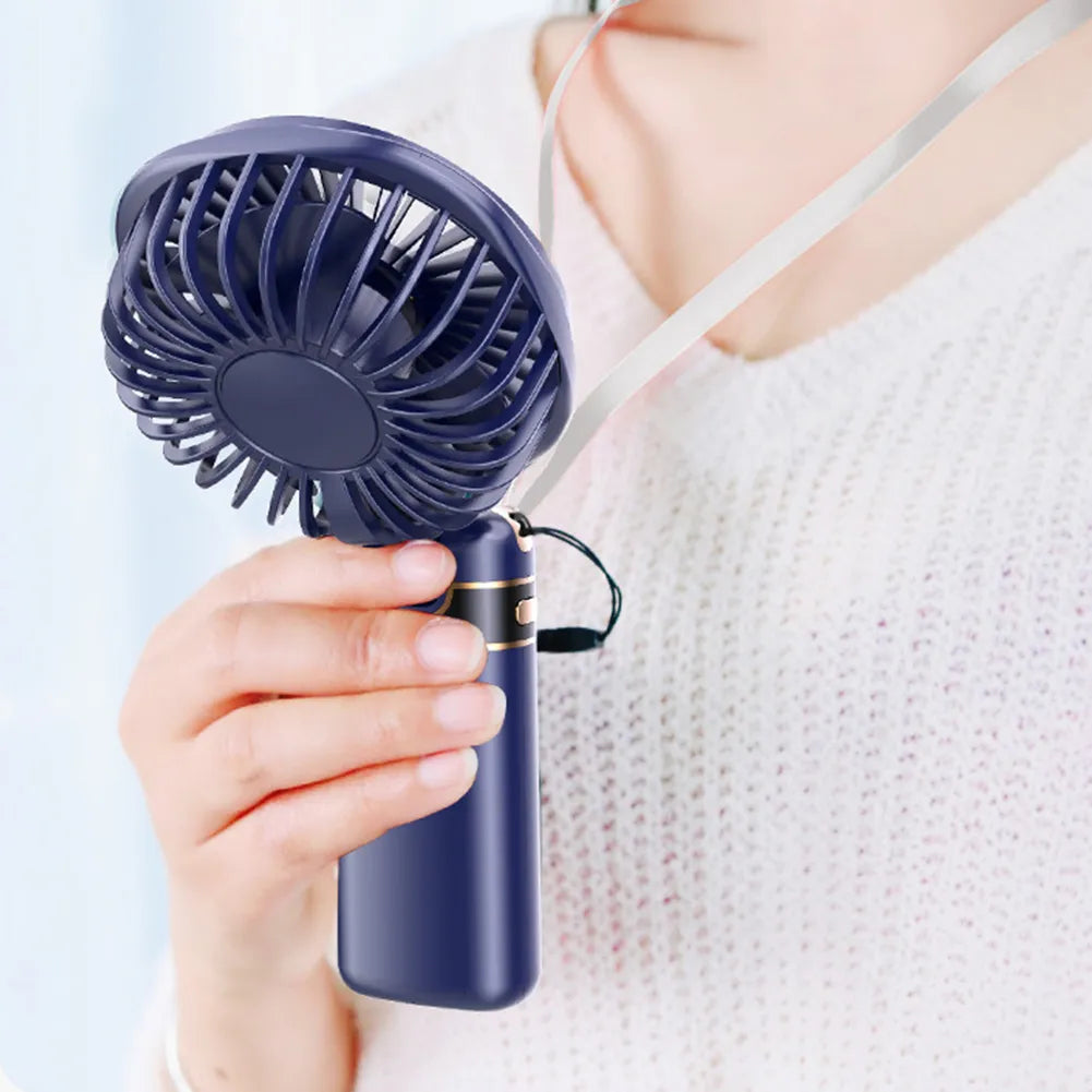 Maroon Asteria handheld cooling fan with 5-speed settings, foldable, rechargeable pocket fan for personal cooling.