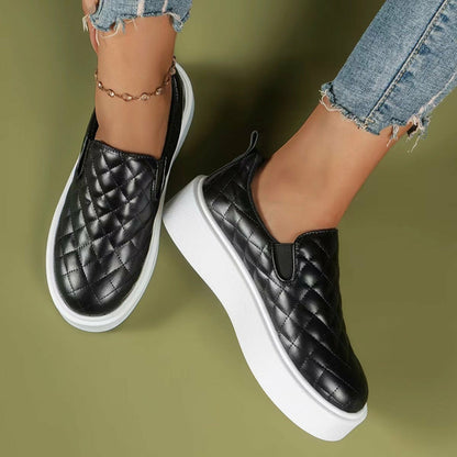 Black and white Coffee Jasper slip-on casual platform shoes with lightweight flat loafers, perfect for everyday wear.