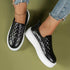 Black and white Coffee Jasper slip-on casual platform shoes with lightweight flat loafers, perfect for everyday wear.