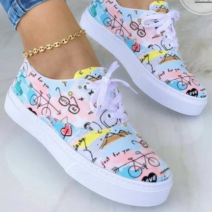 Coffee Jasper 2022 graffiti women’s sneakers with colorful street art design, casual footwear with trendy, artistic style.