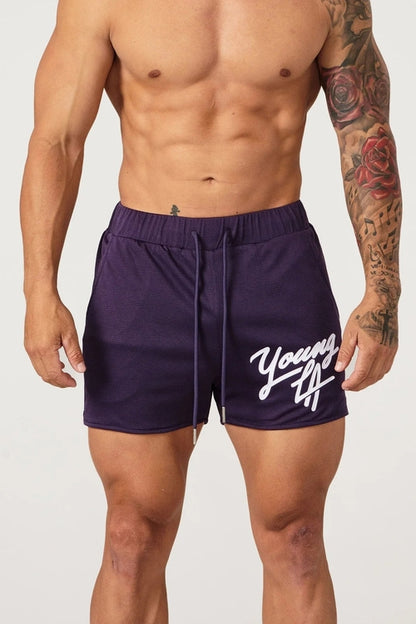 Raspberry Eurybia Young LA trendy beach shorts with vibrant pattern, lightweight fabric, and comfortable fit for casual beachwear.
