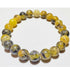 Silver Hestia 8mm serpentine bead elastic stretch bracelet with smooth, polished serpentine stones for a stylish jewelry accessory.