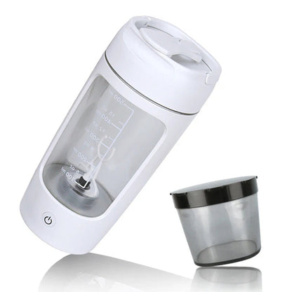 Maroon Asteria USB electric protein shaker bottle with a clear body, black lid, and mixing blade, portable and rechargeable for beverages.