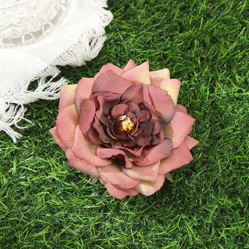 Raspberry Eurybia Away Hawaiian Flower Hair Clip with vibrant floral design for hair accessories and styling.
