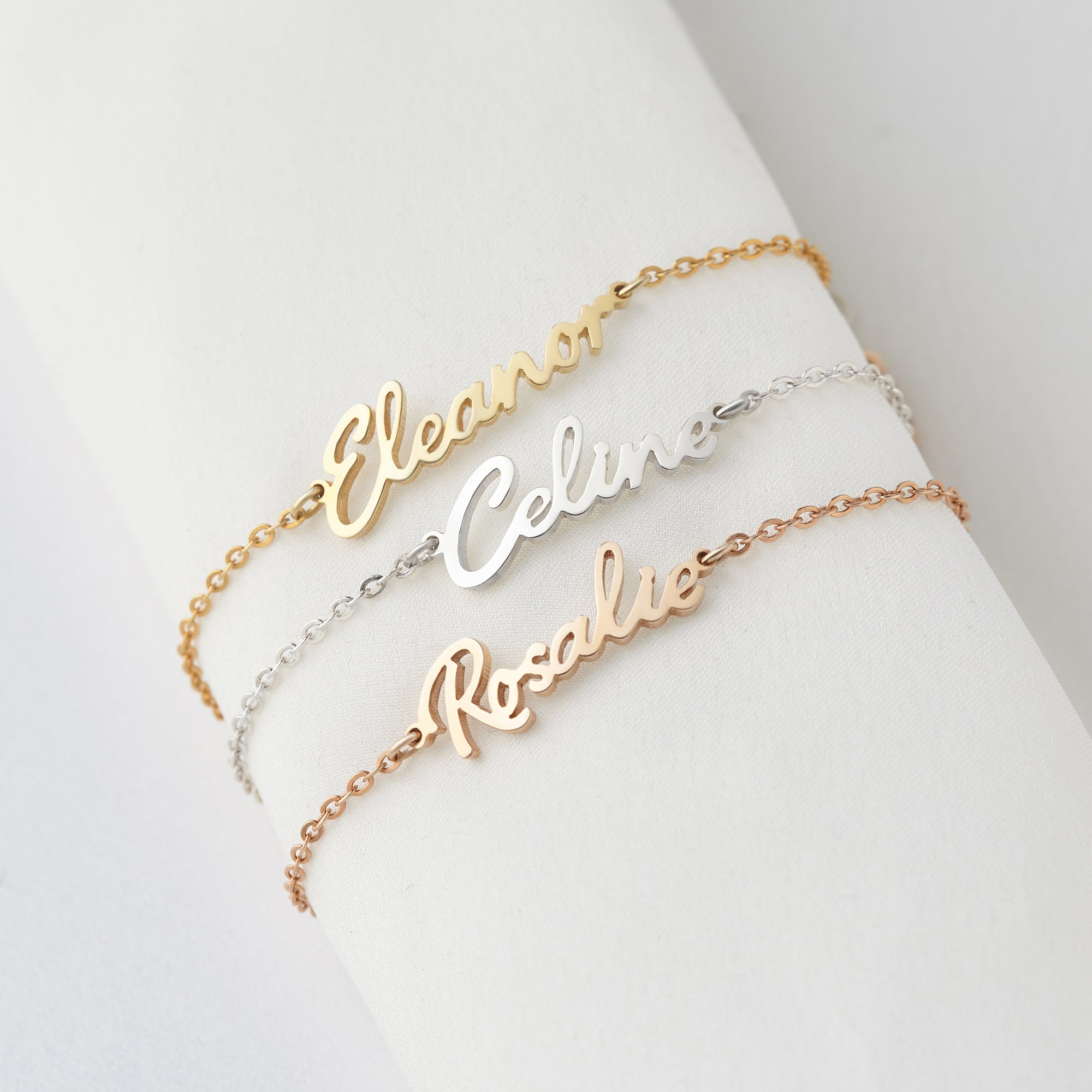Green Millie cursive name bracelet, personalized jewelry for her, featuring elegant script and adjustable chain design.