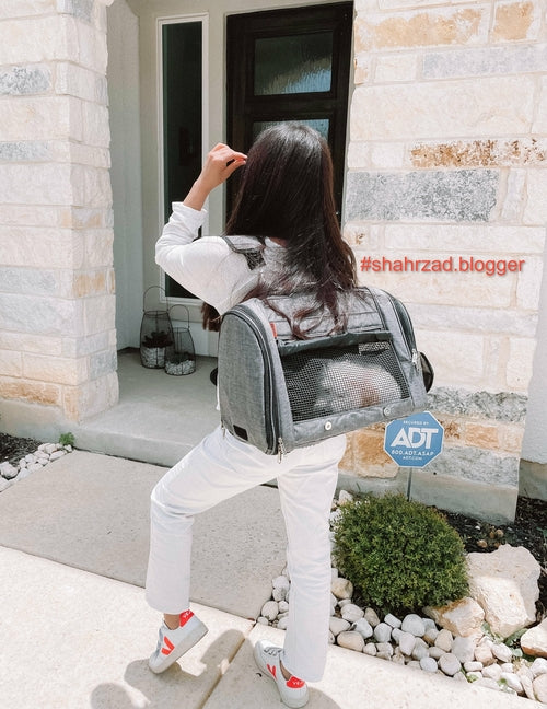 Pink Coconut 358 Hideaway™ Backpack pet carrier with breathable mesh sides and adjustable straps for comfortable pet travel.