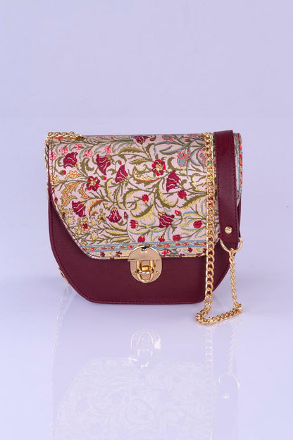 Elegant handmade Oriental floral crossbody bag by Chocolate Eros, featuring intricate design and soft leather material.
