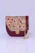 Elegant handmade Oriental floral crossbody bag by Chocolate Eros, featuring intricate design and soft leather material.