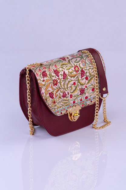 Elegant handmade Oriental crossbody handbag by Chocolate Eros featuring floral design and intricate craftsmanship.