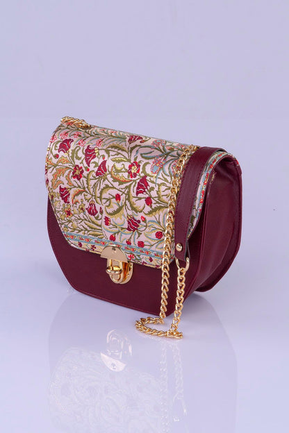 Elegant handmade Oriental crossbody handbag by Chocolate Eros featuring floral design and intricate craftsmanship.