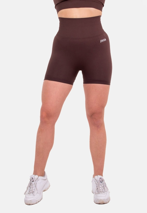 Coffee-colored Pear Juniper Shape high-waisted seamless shorts, front view showcasing their fitted, stretchy design.