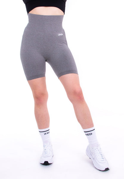 Gray Pear Juniper Shape high-waisted seamless shorts shown from the front, highlighting their fitted design and smooth fabric.
