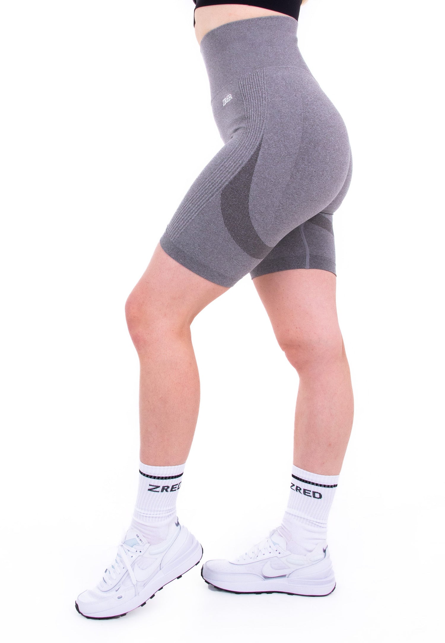 Gray Pear Juniper Shape High-Waisted Seamless Shorts displayed on a model, highlighting their fit and smooth fabric.
