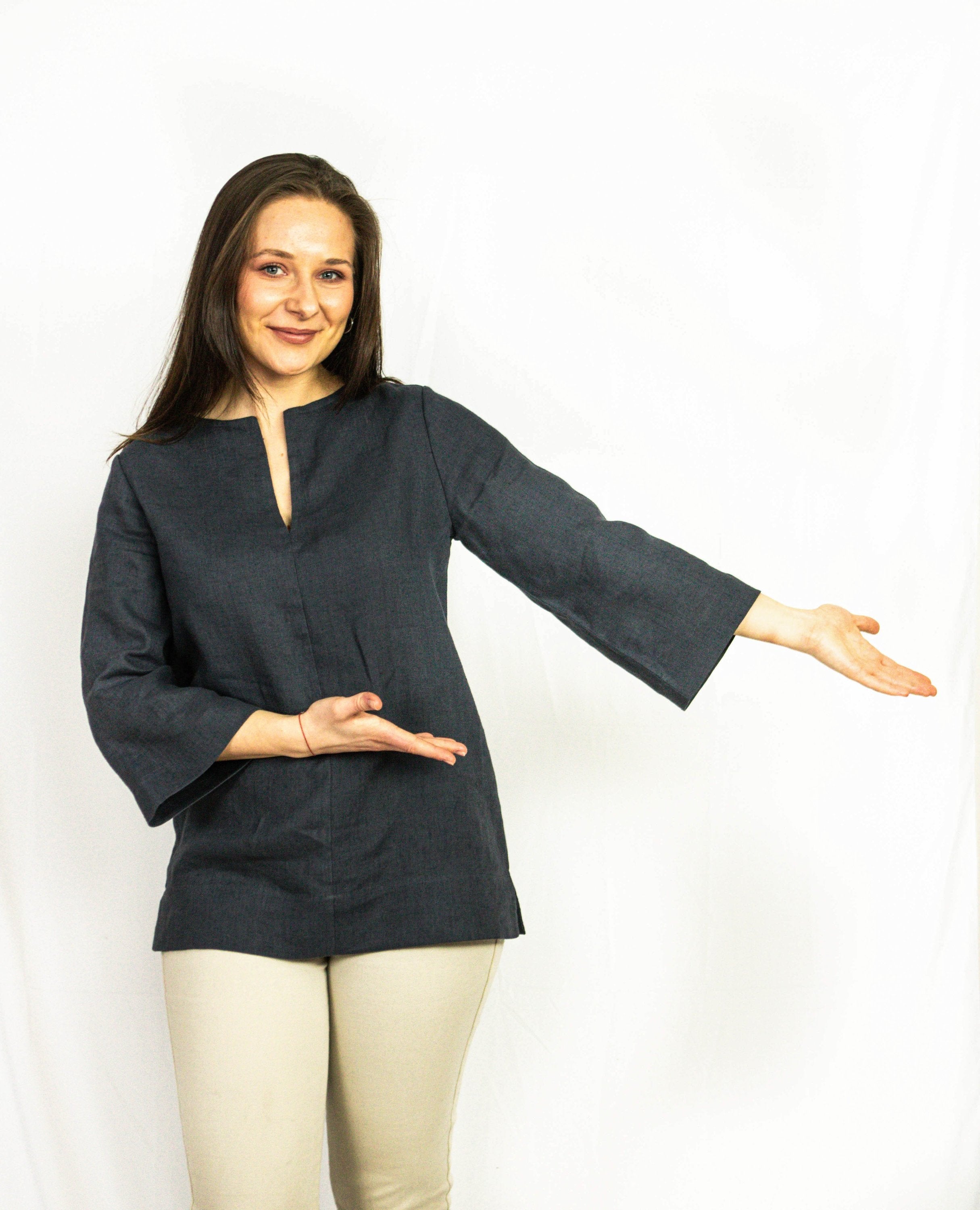 Asphalt grey linen oversize top by Magenta Sugarplum, featuring relaxed fit and stylish design, displayed on a hanger.