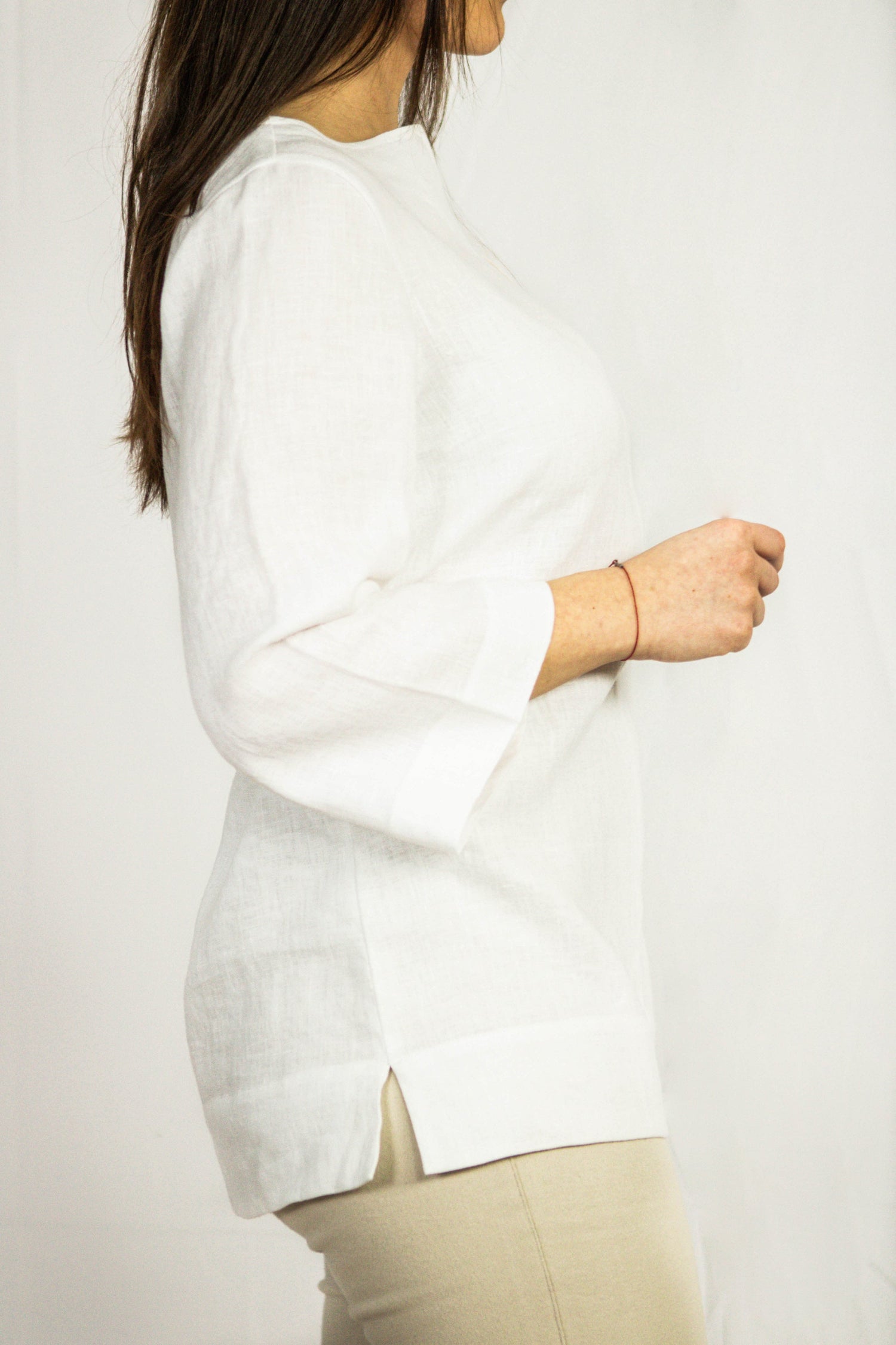 Asphalt grey linen oversize top from Magenta Sugarplum featuring a relaxed fit and casual style, displayed on a hanger.