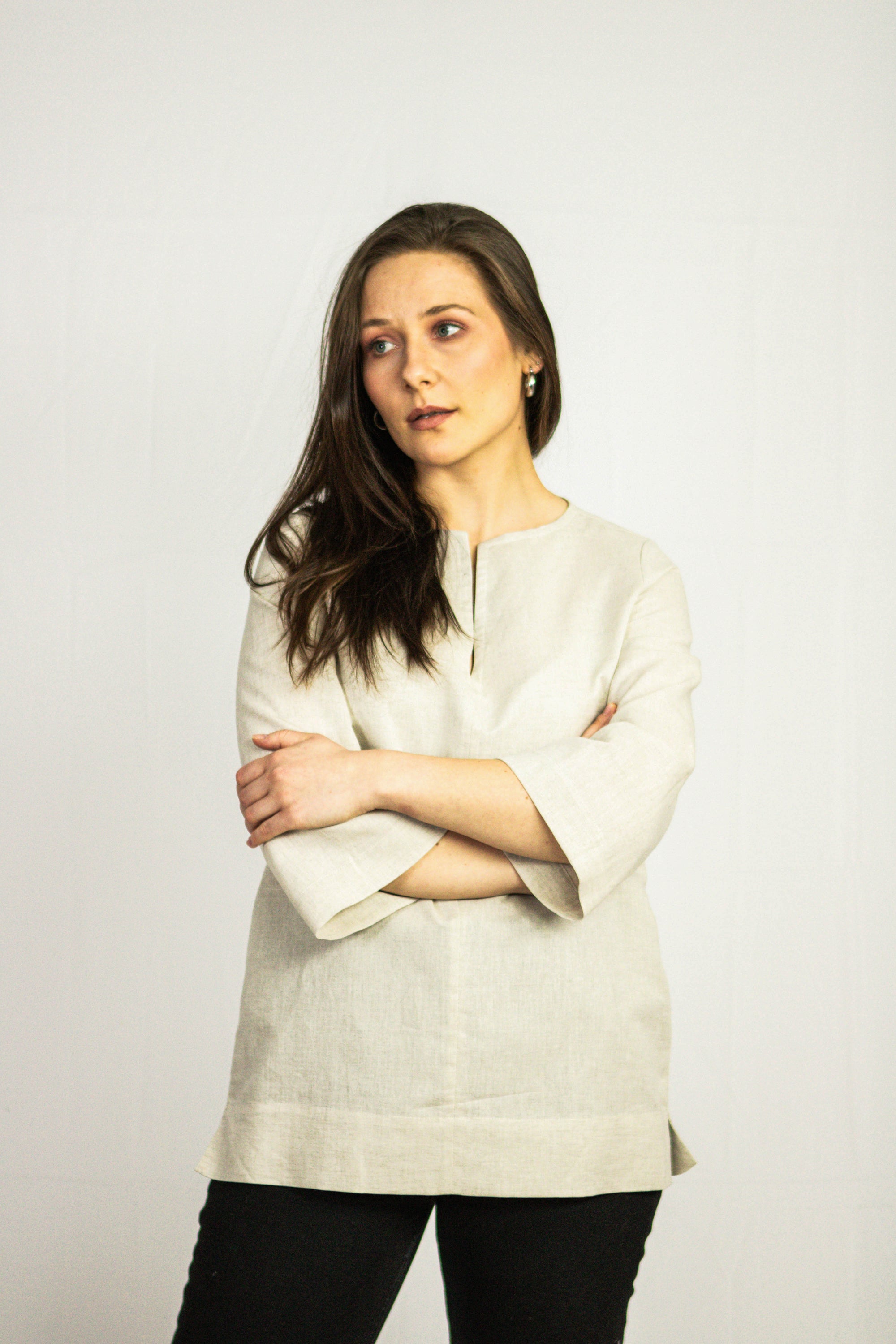 Dark plum linen oversize top from Magenta Sugarplum featuring a relaxed fit and casual style, displayed on a hanger.