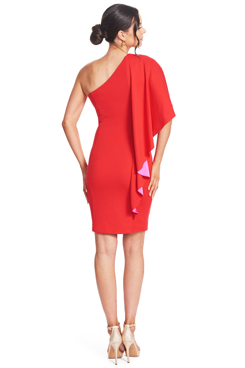 Red Shero asymmetric cape dress by Peach Dionysus, back view of fitted bodycon cocktail dress with contrasting details.