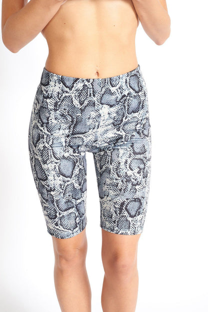 Azure Thanatos snake print biker shorts laid flat, showcasing the bold snake pattern and stretchy fabric for a stylish, fitted look.