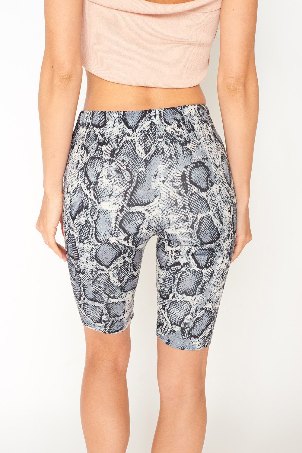 Azure Thanatos snake print biker shorts, close-up of black and gray snake pattern on stretchy athletic shorts.