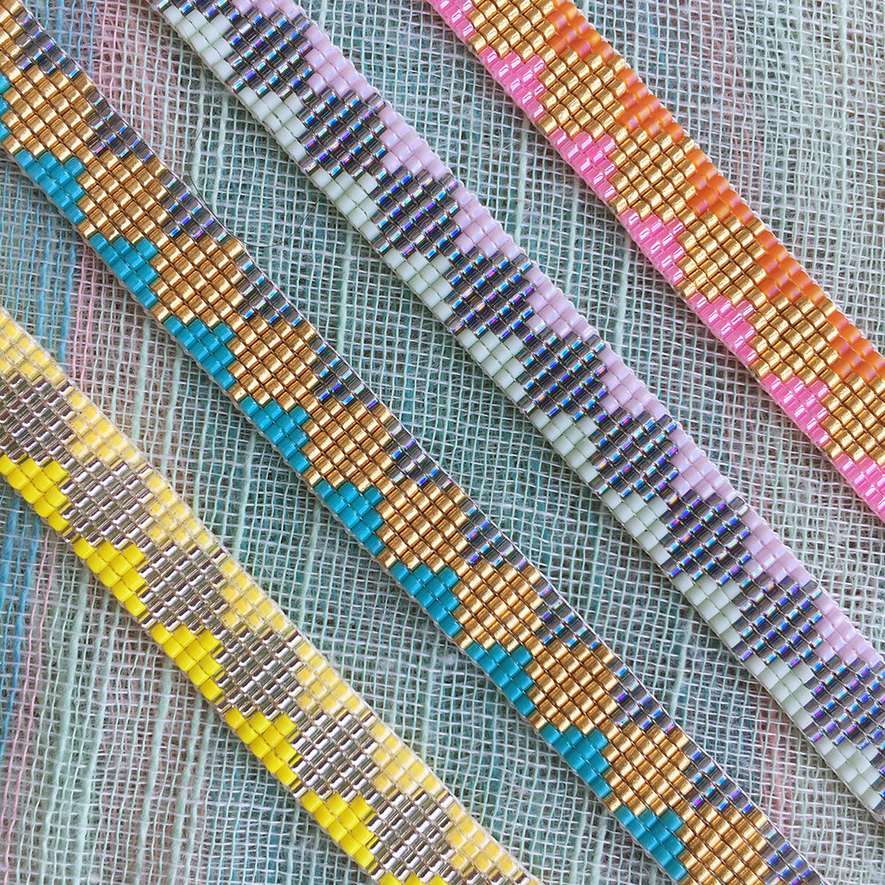 Yellow Athena Skinny Soleil bracelet featuring yellow, turquoise, and mint beads on a delicate bracelet style.