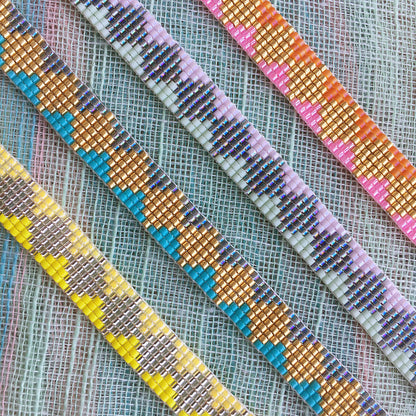 Yellow Athena Skinny Soleil bracelet featuring yellow, turquoise, and mint beads on a delicate bracelet style.