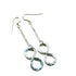 Sterling silver infinity earrings with hammer pattern by Blue Crius, featuring a sleek and modern jewelry design.