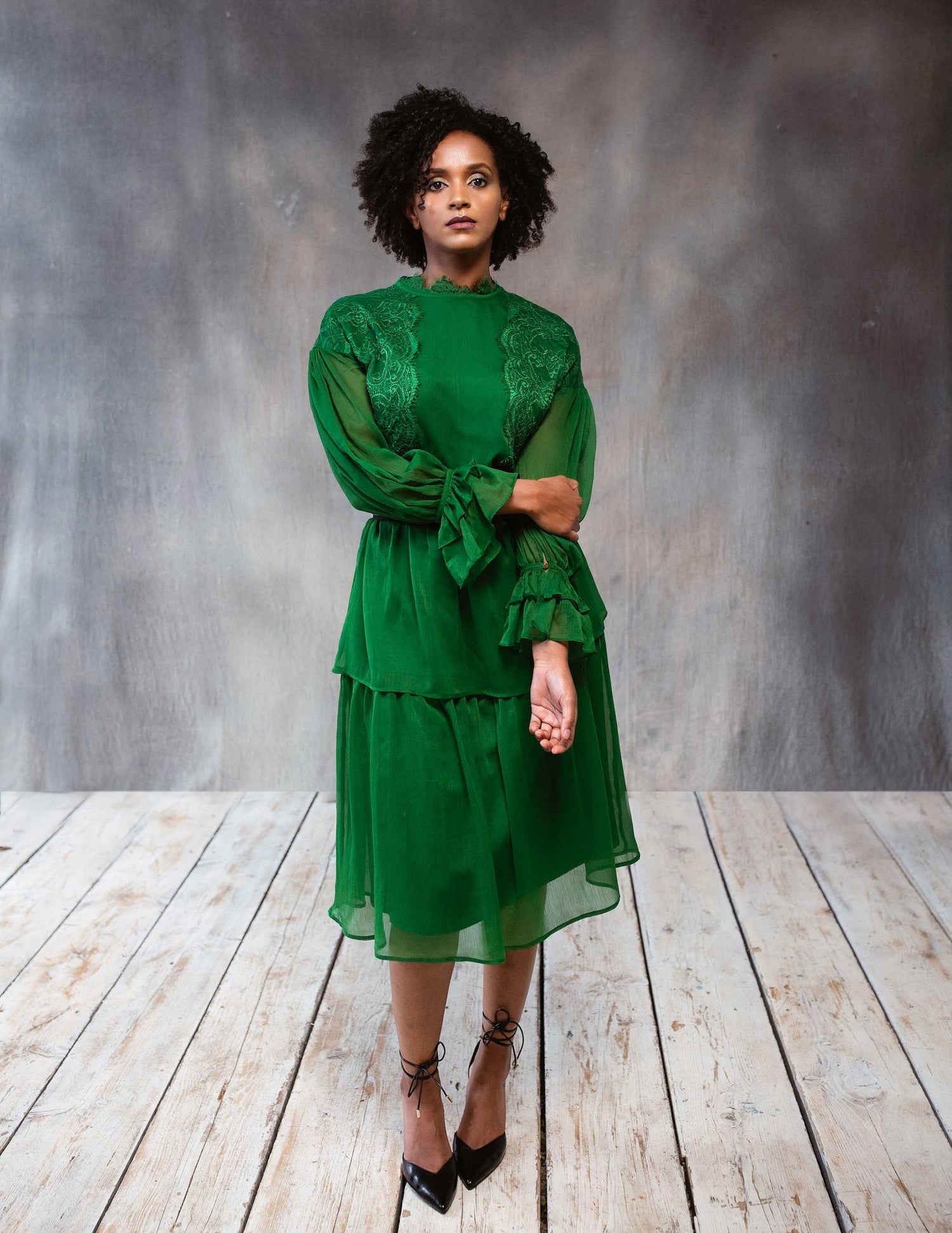 Green lace dress by BethAle London for women, featuring intricate lace details and a stylish, elegant design.