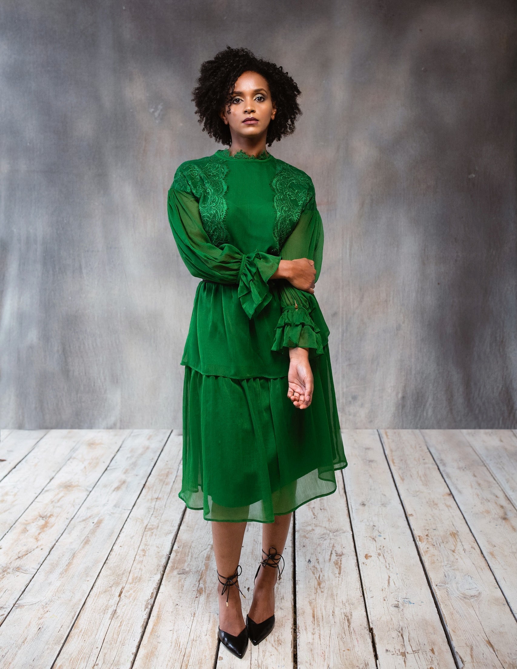 Green lace dress by BethAle London for women, featuring intricate lace details and a stylish, elegant design.