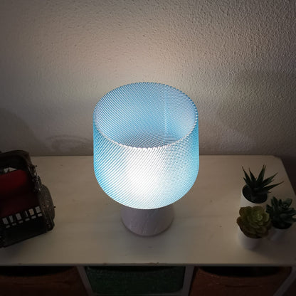 Azure Pontus Summer Glow Table Lamp in blue with a sleek, modern design, perfect for ambient lighting in living spaces.